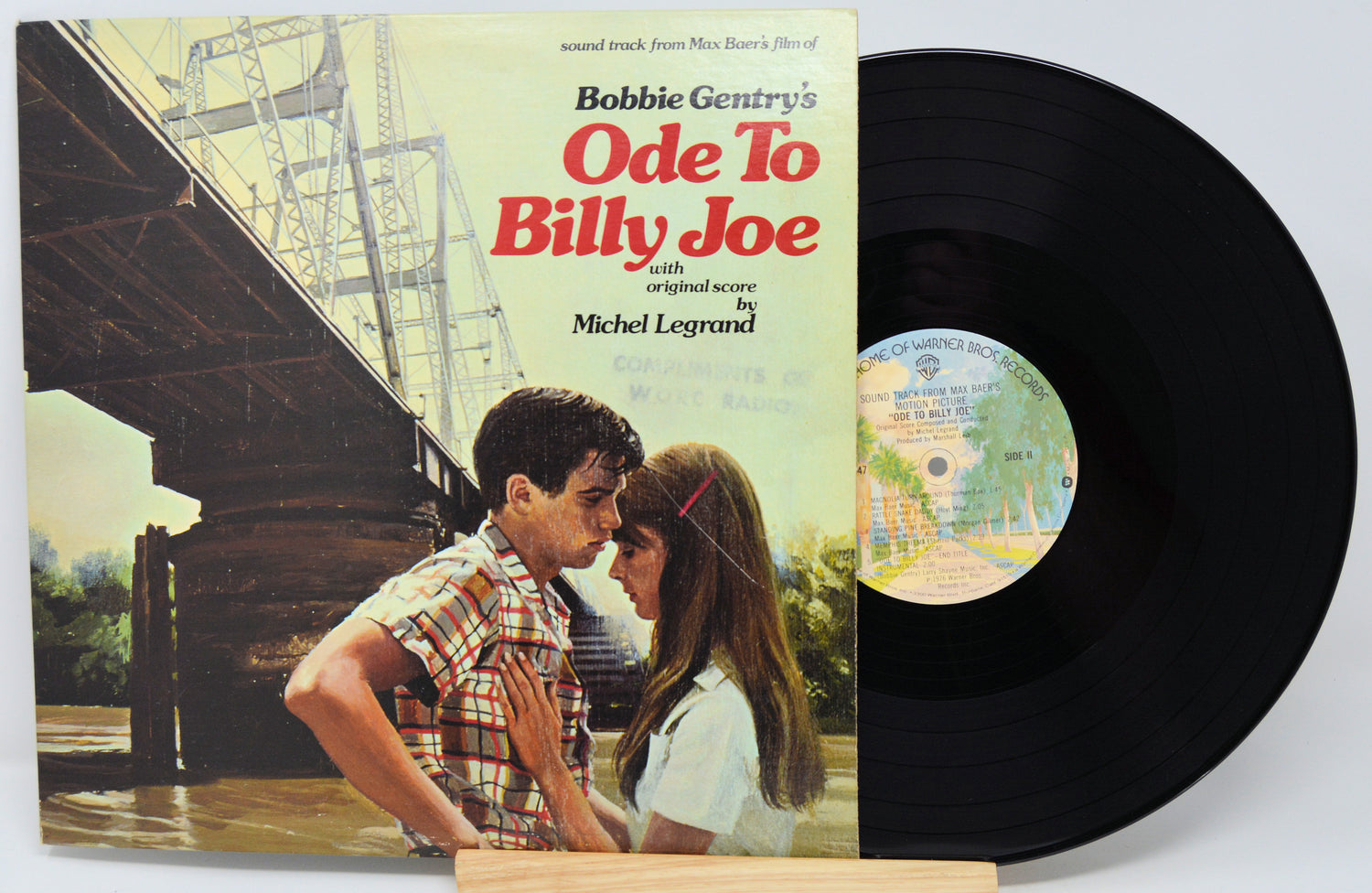 Vinyl record with cover featuring a couple and text 'Bobbie Gentry's Ode To Billy Joe' on a white background