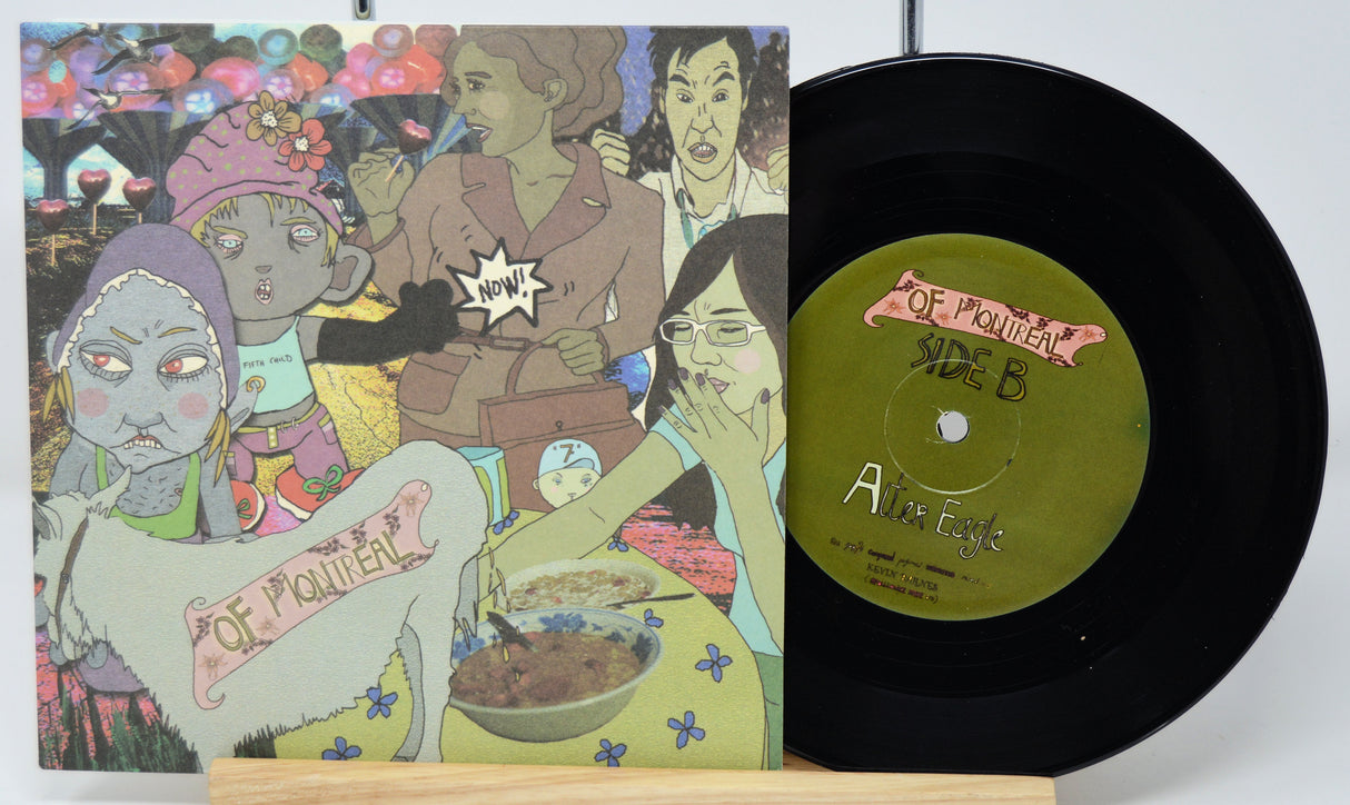Vinyl record with colorful cover featuring illustrated characters and a green label.
