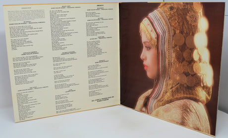 Album cover with text on the left and a decorative image of a person on the right.