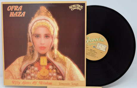 Vinyl record with cover featuring a woman in traditional attire and 'Ofra Haza' text.