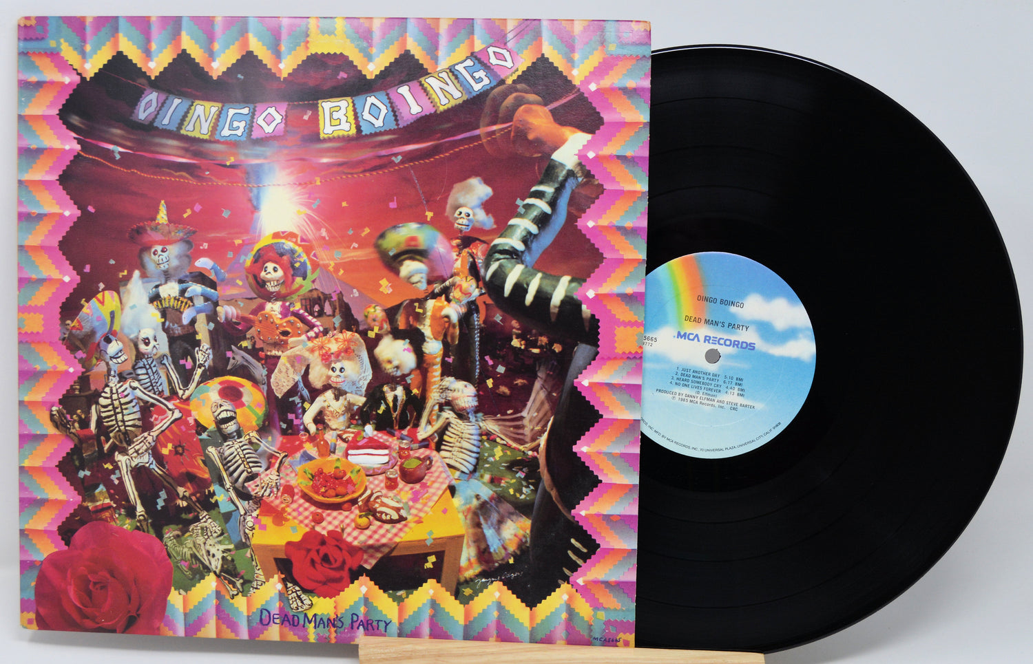 Vinyl record with colorful cover featuring a party scene and 'Bingo-Boing' text.
