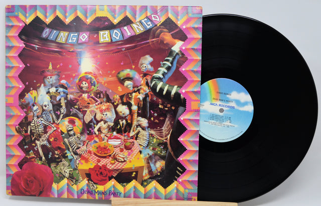 Vinyl record with colorful cover featuring a party scene and 'Bingo-Boing' text.