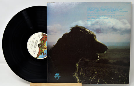 Vinyl record with a dog silhouette on the cover