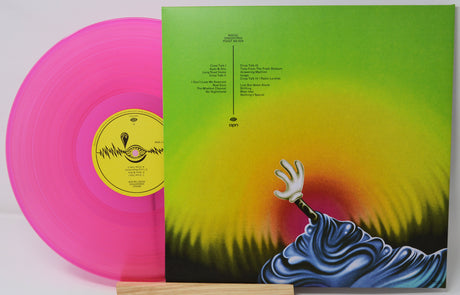 Vinyl record with pink disc and colorful cover featuring a person emerging from water.