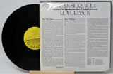 Vinyl record with a yellow label and its cover displaying text about Roy Orbison.