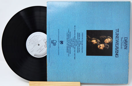 Vinyl record with 'Talking Heads' album cover on a white background