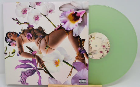 Orquídeas album front cover image with Kali Uchis and floral orchid background
