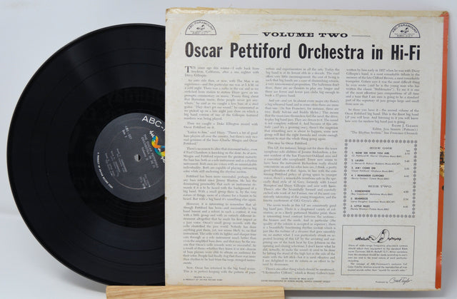 Back cover of Oscar Pettiford Orchestra in Hi-Fi Vol. 2 LP with detailed liner notes and exposed black vinyl record