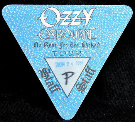 Triangular backstage pass with 'Ozzy Osbourne' white and black text on a blue background.