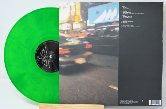 Back cover and tracklist of PJ Harvey's Stories From the City, Stories From the Sea album with translucent green vinyl
