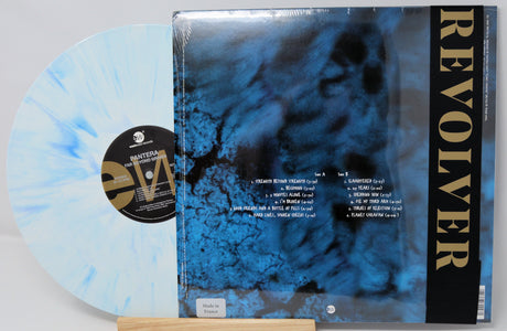 Back cover of Pantera's Far Beyond Driven limited edition marbled blue-white vinyl LP, track list visible, Revolver exclusive.
