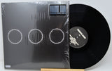 Front cover and vinyl record of Swedish House Mafia Paradise Again vinyl album with three circles artwork