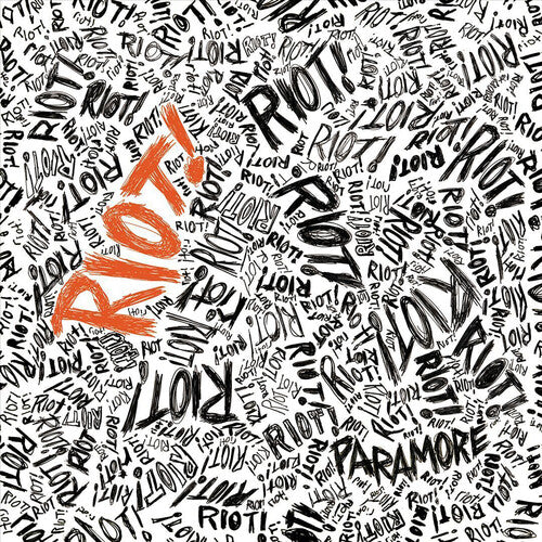 Pattern of the word 'RIOT!' in various styles with 'PARAMORE' branding.