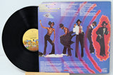 Back cover of Parliament Funkentelechy Vs. The Placebo Syndrome vinyl LP featuring band members in funky outfits