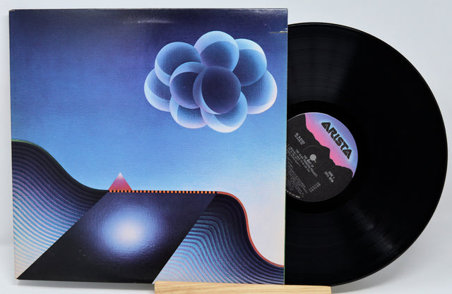 Vinyl record with a unique cover featuring abstract designs and the Arista label.