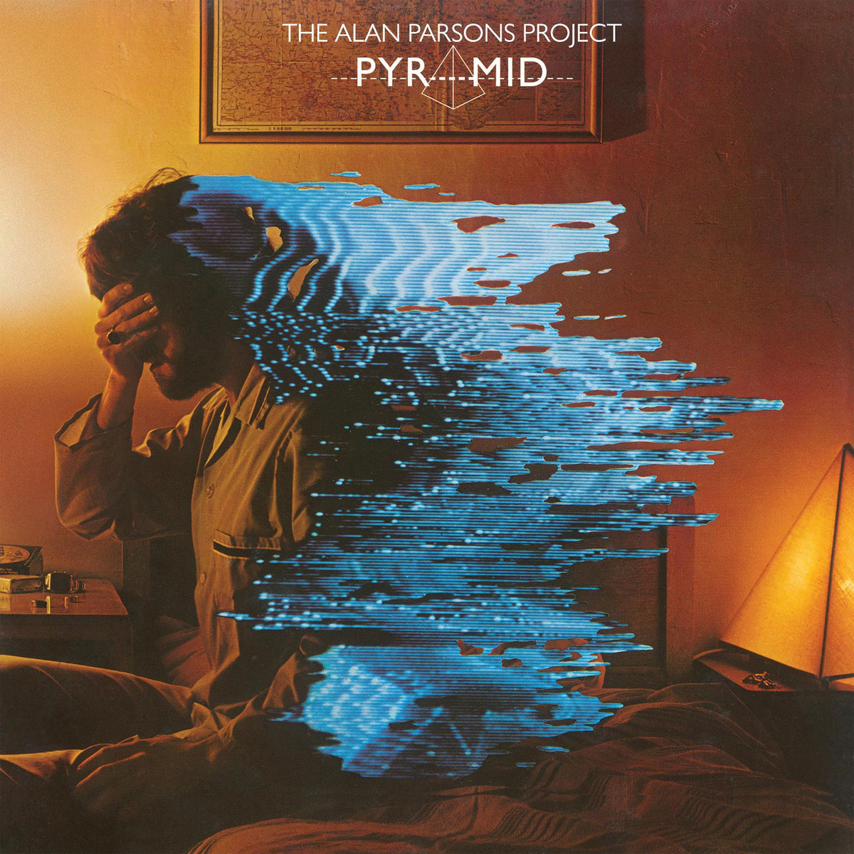 Album cover for 'Pyramid' by The Alan Parsons Project featuring a person in bed with blue light effect.