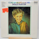 Vinyl record cover for 'Coat of Many Colors' by Dolly Parton with a portrait illustration on the front.