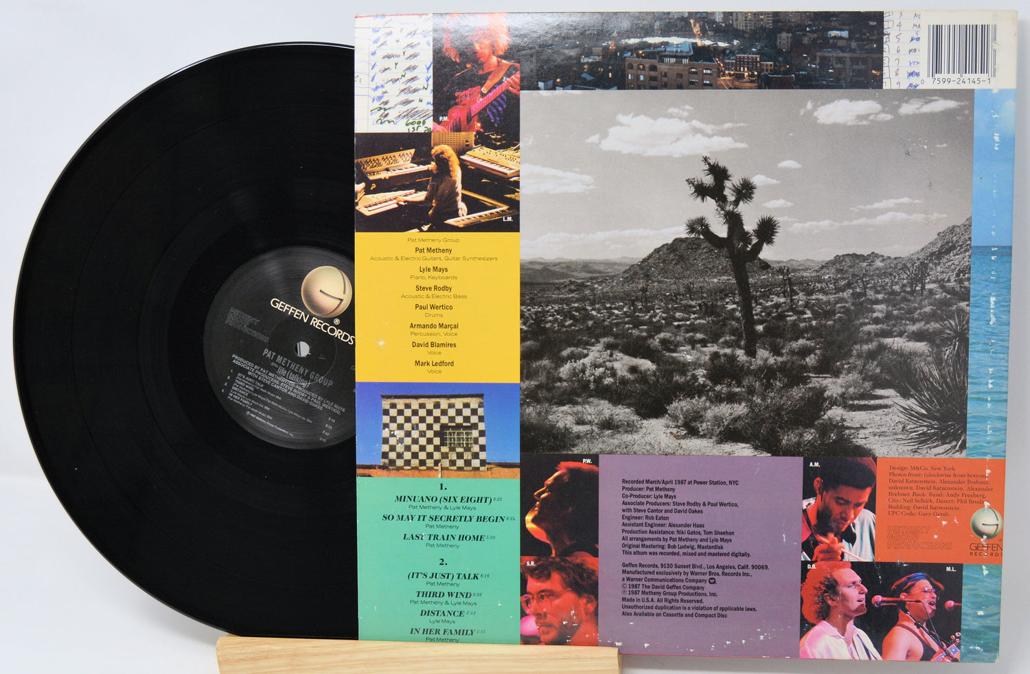 Vinyl record with a cover featuring a person in a grand hall.