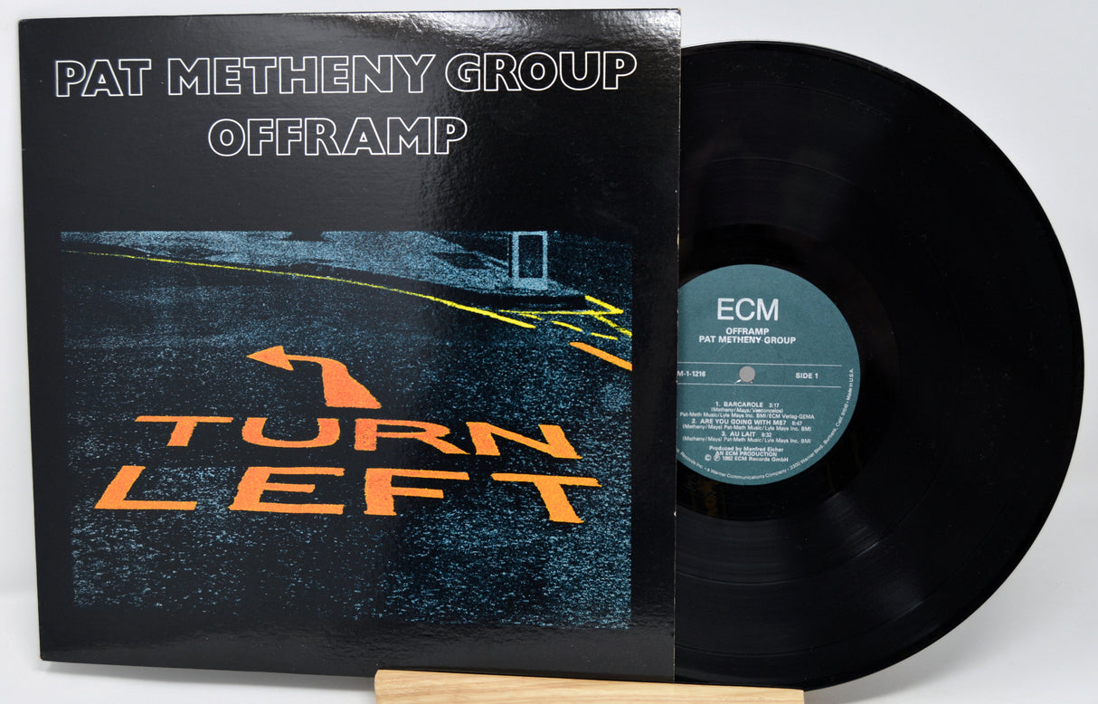 Vinyl record with 'Pat Metheny Group Offramp' album cover on a white background
