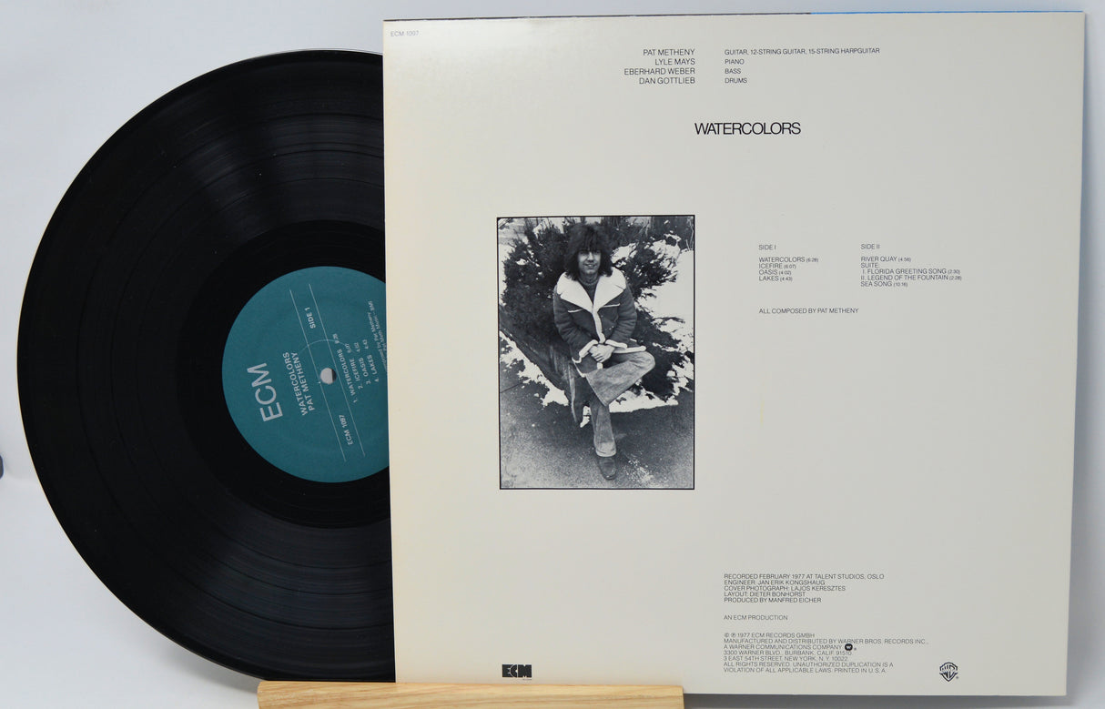 Vinyl record with cover displaying 'ECM' label and black and white photo of a person.