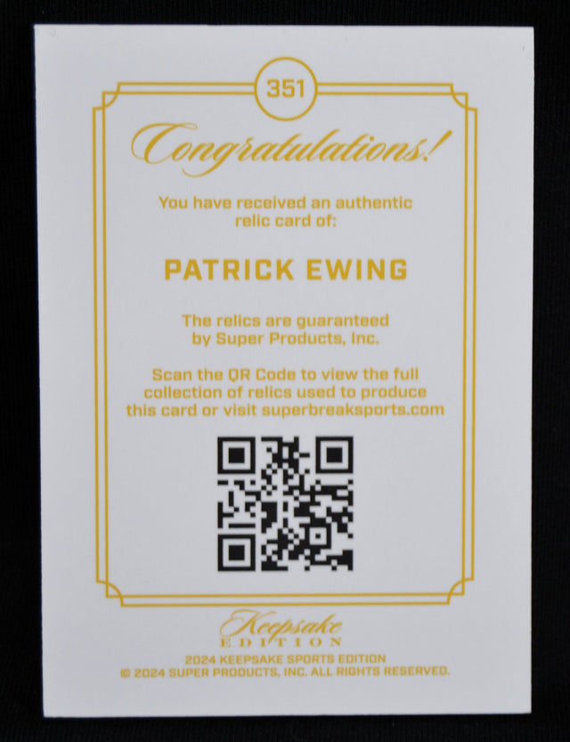 Certificate of authenticity for Patrick Ewing relic card with QR code and gold border