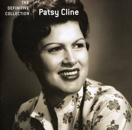 Patsy Cline smiling on The Definitive Collection album cover in a floral blouse
