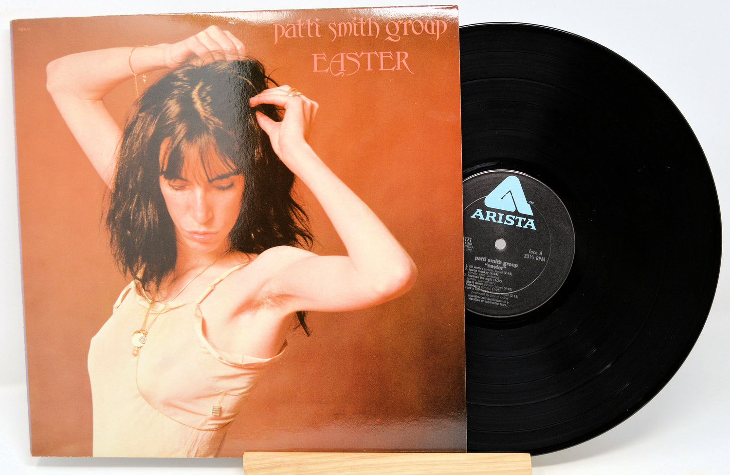 Used vinyl record of Patti Smith - Easter with the album cover and vinyl record visible.