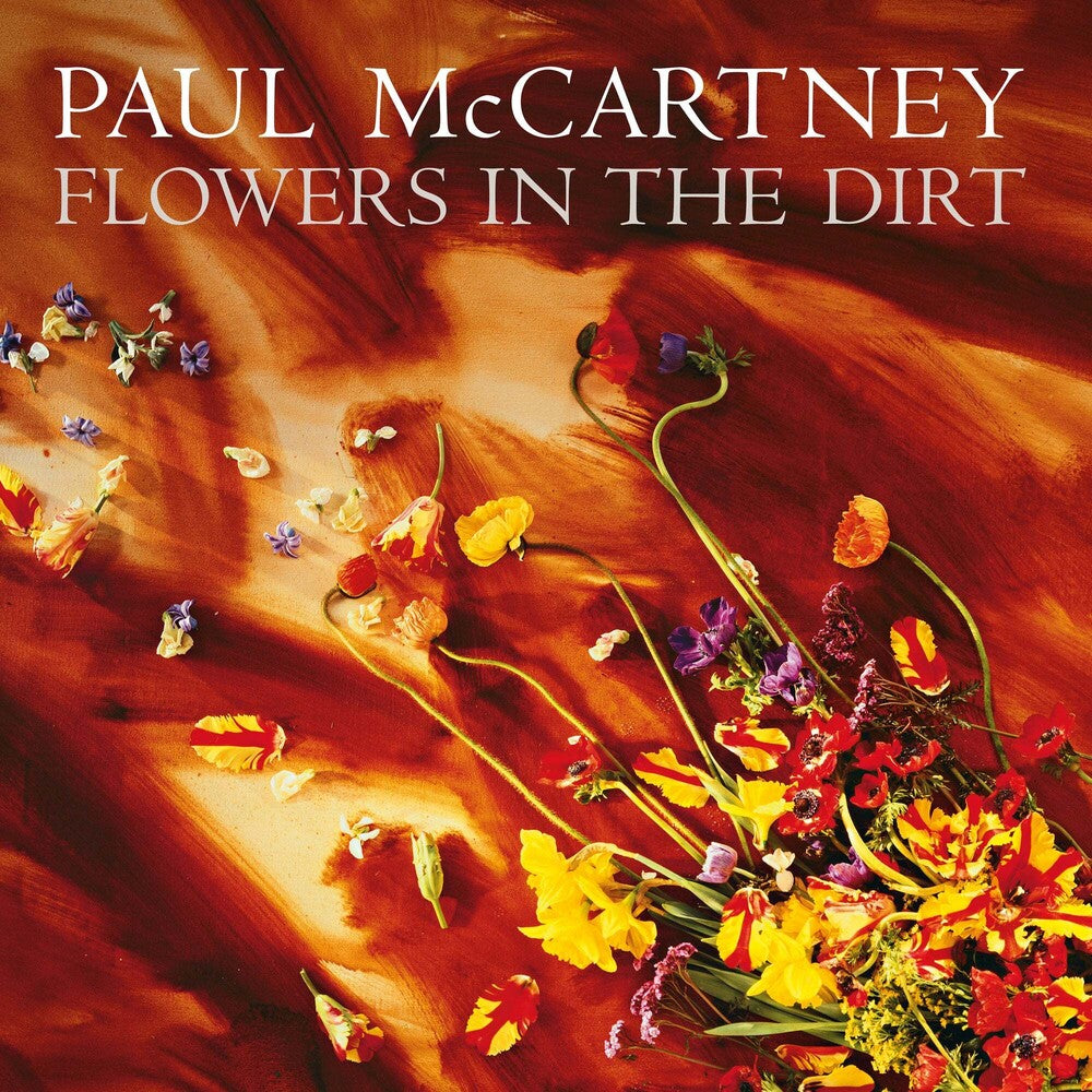 Album cover with flowers and text 'Paul McCartney Flowers in the Dirt' on a brown background