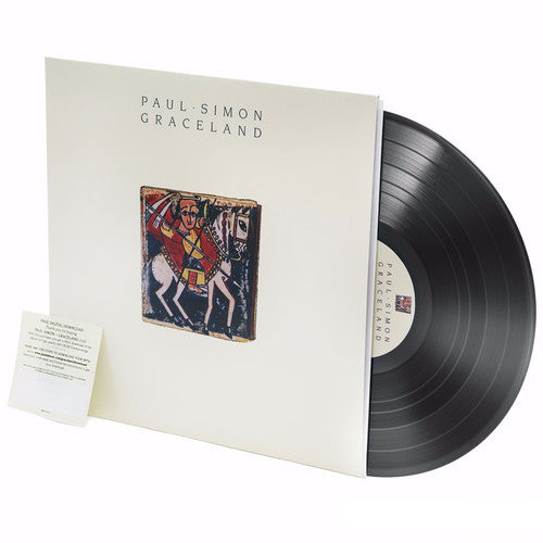 Vinyl record with 'Paul Simon Graceland' album cover on a white background