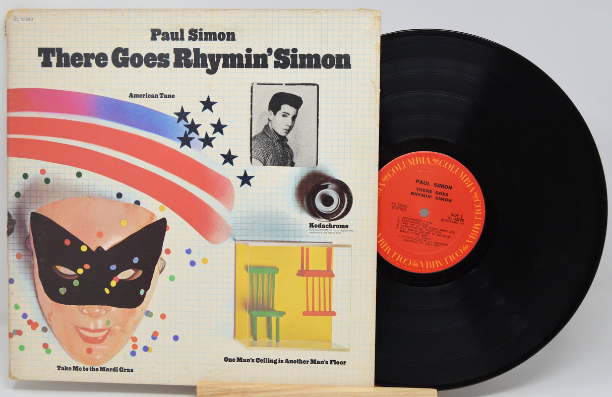 Vinyl record with cover featuring a colorful design and text