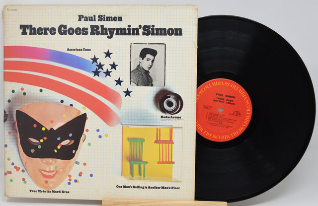 Vinyl record with cover featuring a colorful design and text