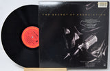 Vinyl record with a cover featuring four band members and text 'Live in London 1969/71'.
