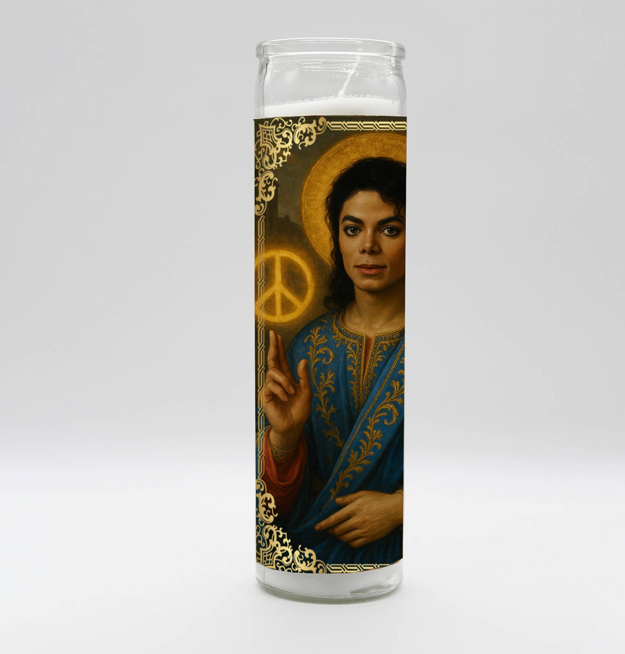 Candle with pop icon saint artwork, peace symbol, golden halo, and detailed blue garment