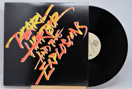 'Pearl Harbor and The Explosions Self Titled' Vinyl record with colorful text on the cover
