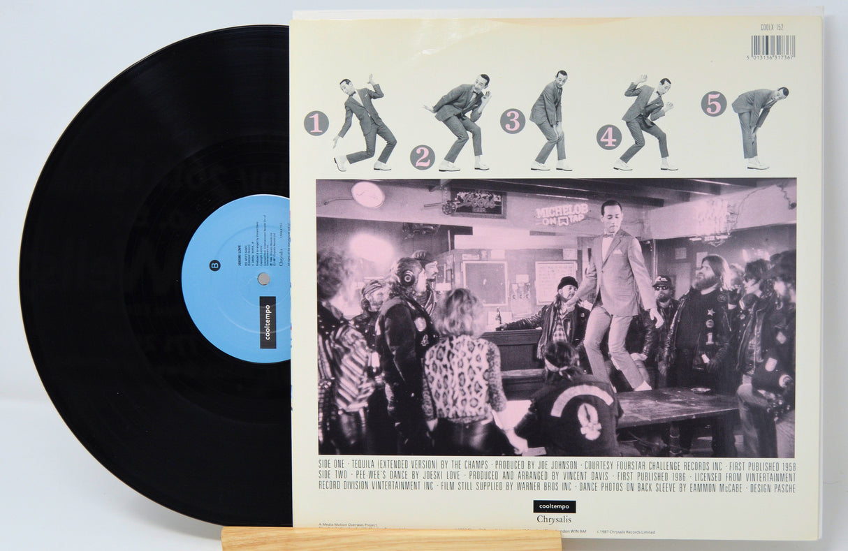 Back cover of Pee-Wee's Big Adventure vinyl showing dance steps and bar scene with Pee-Wee Herman