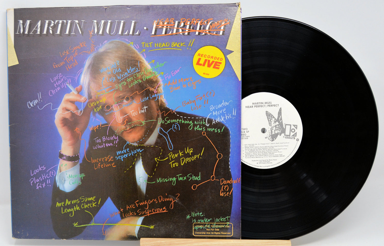 Front cover of Martin Mull's Near Perfect / Perfect LP with annotated portrait and notes