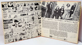 Opened vinyl gatefold of Pete Brown & Piblokto! album showing comic art and band members