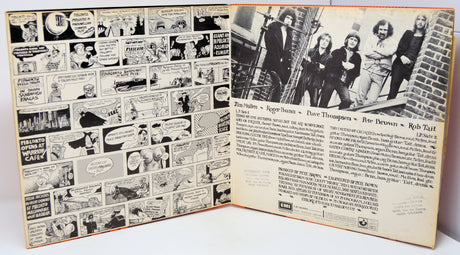 Opened vinyl gatefold of Pete Brown & Piblokto! album showing comic art and band members