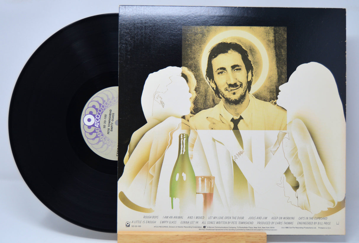 'Pete Townshend Empty Glass' Vinyl record with an angelic cover featuring a person holding a bottle and glass.