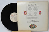 Vinyl record and cover with floral design and text on a white background
