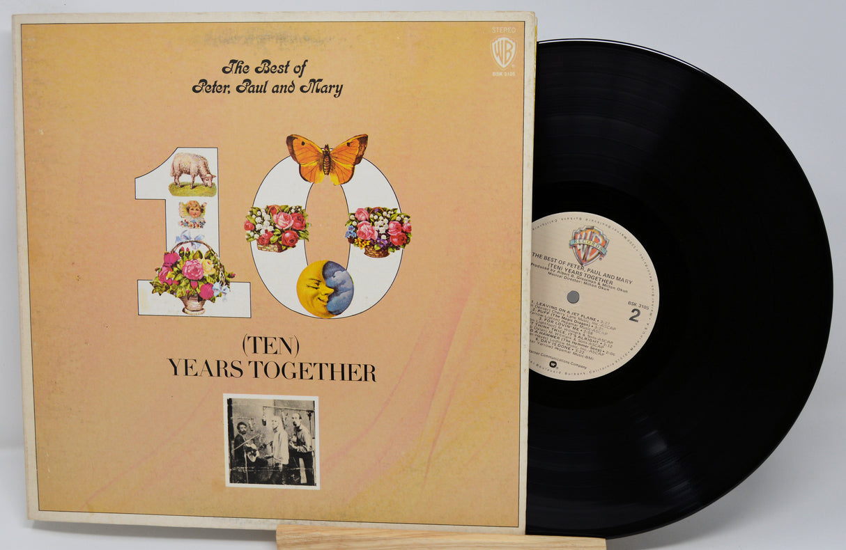 Vinyl record and cover titled 'The Best of Peter, Paul and Mary Ten Years Together' on a white background