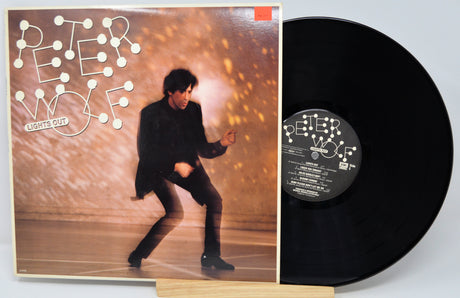 Vinyl record with cover featuring a person and album title 'Peter Wolfe'.