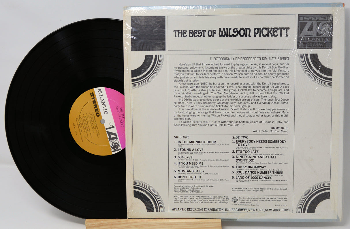 Vinyl record and its cover titled 'The Best of Wilson Pickett' on a white background