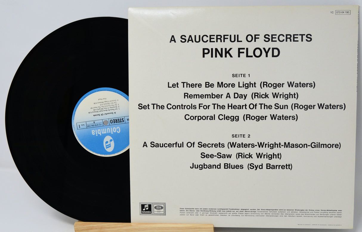 Vinyl record with cover displaying tracklist of Pink Floyd's 'A Saucerful of Secrets'.