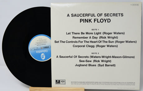 Vinyl record with cover displaying tracklist of Pink Floyd's 'A Saucerful of Secrets'.