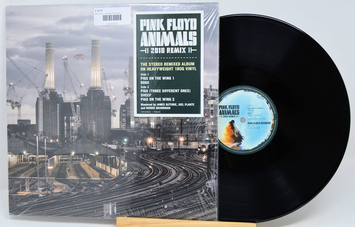 Pink Floyd Animals - 'I 2019 Remix II' vinyl record album with the illustrated album cover on the left and the black 12-inch record partially visible on the right, set against a plain light background.