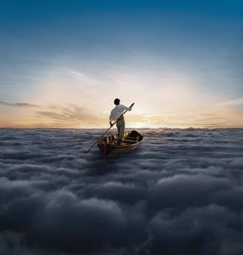 Person rowing a boat on a sea of clouds with a sunset in the background