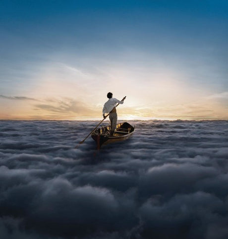 Person rowing a boat on a sea of clouds with a sunset in the background