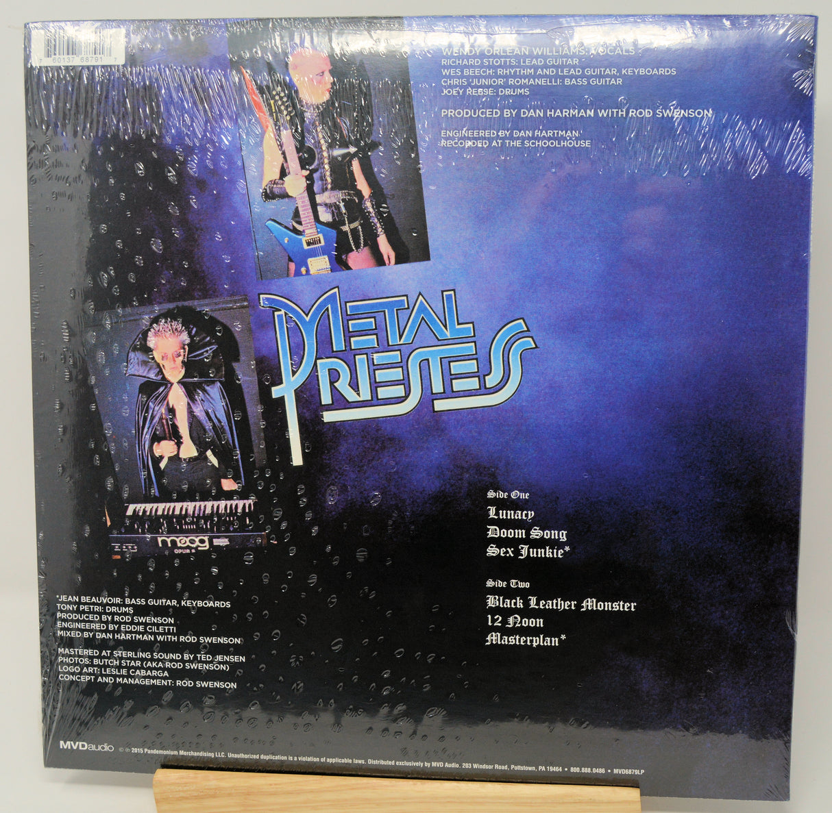 Back cover of a vinyl record with 'Metal Priests' branding and album tracklist.