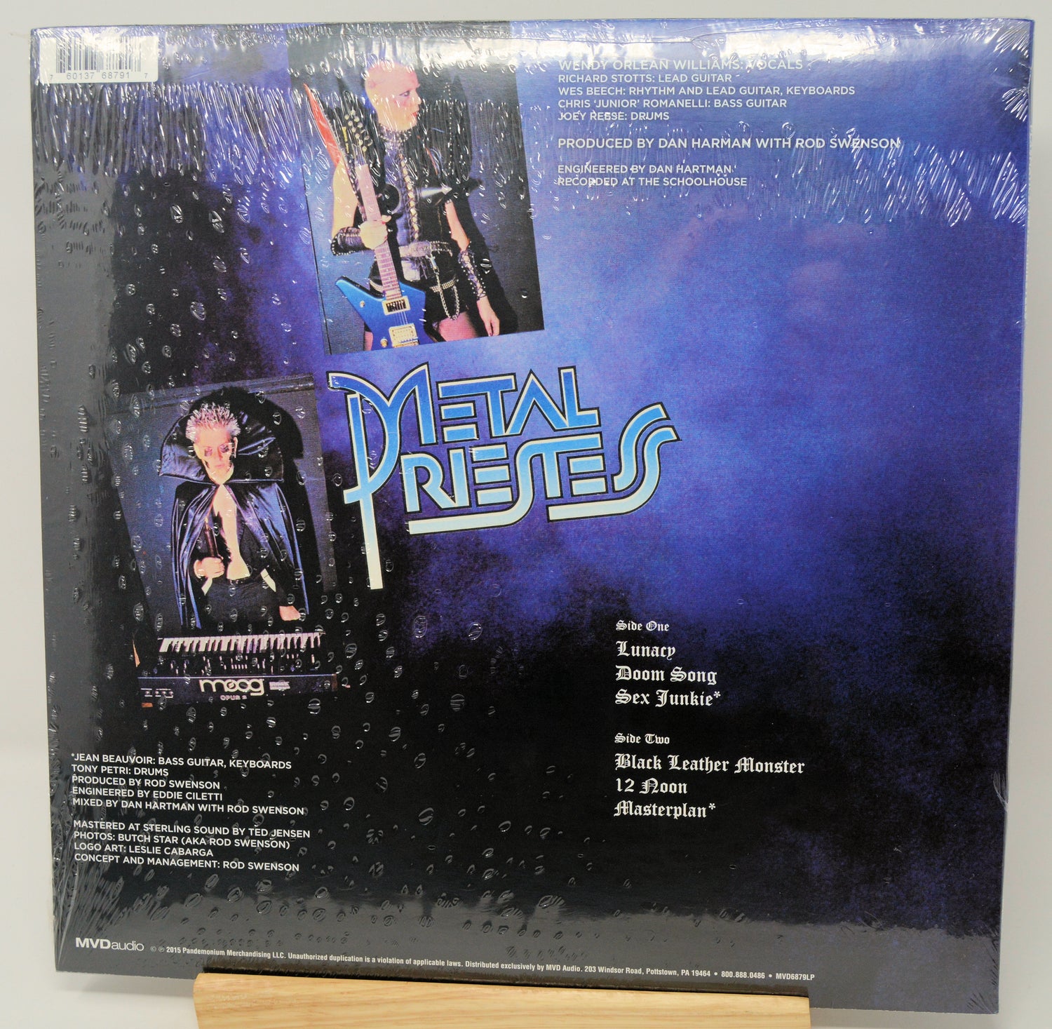 Back cover of a vinyl record with 'Metal Priests' branding and album tracklist.